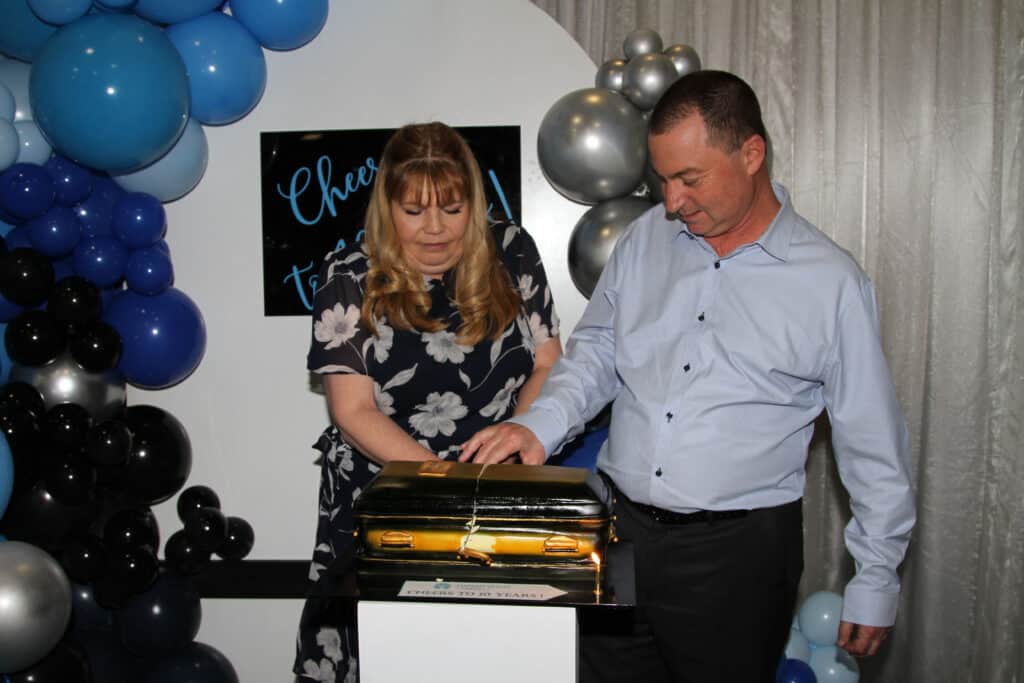 Nepean Valley Funerals 10 years celebration - cutting cake